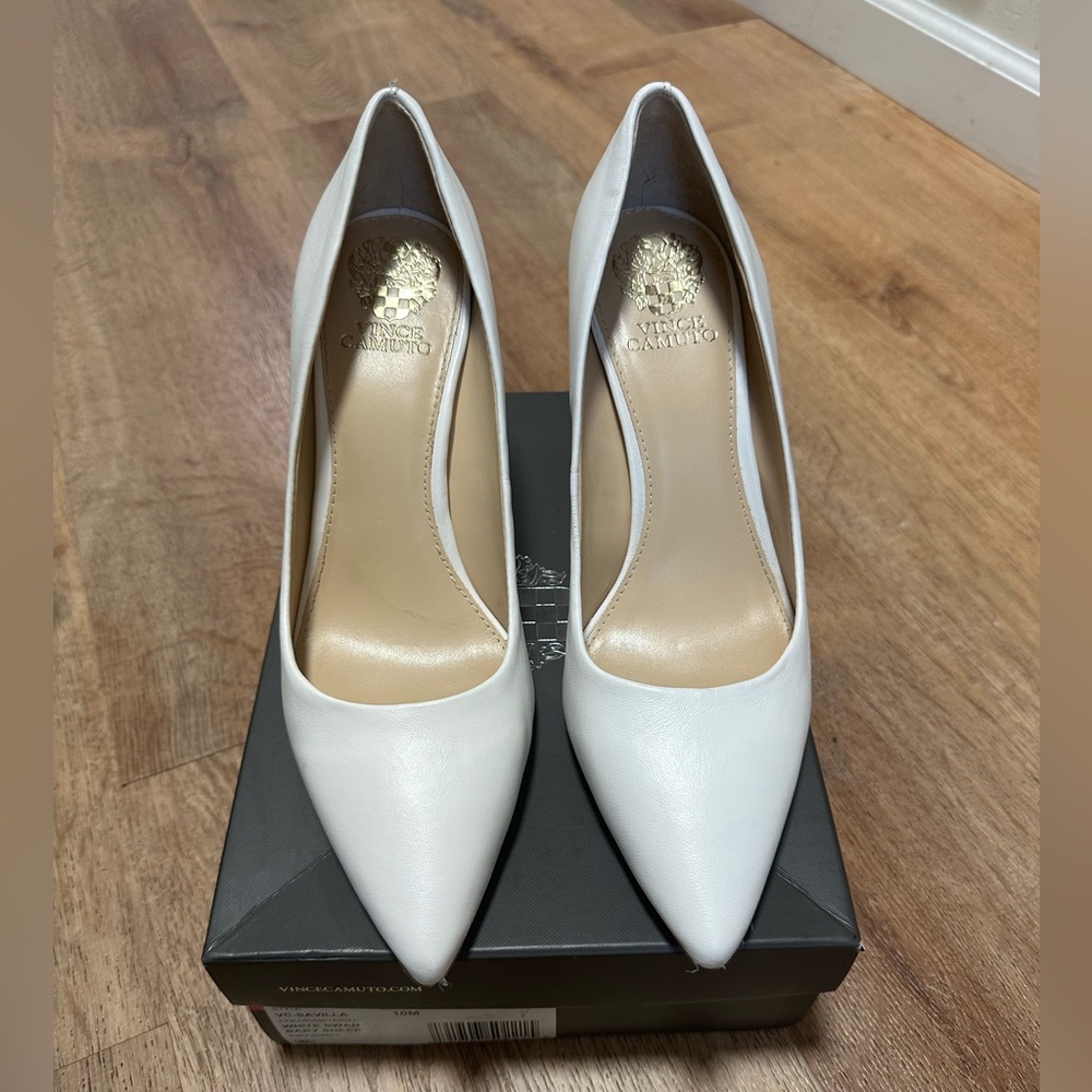 White leather pumps